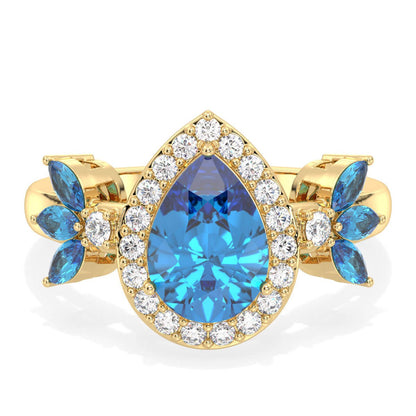 Pear Shaped Swiss Blue Topaz Halo Ring - Yellow